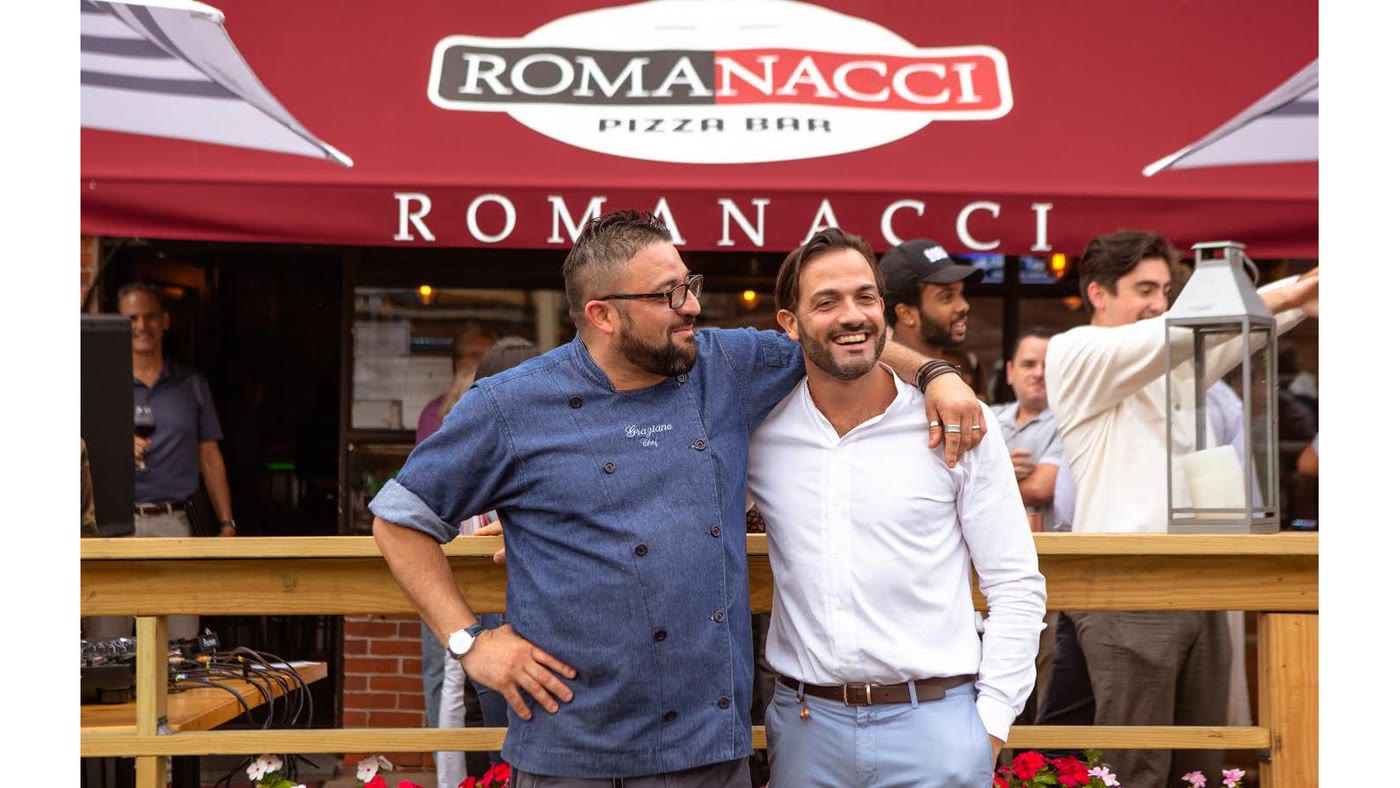 The Romanacci owners outside the pizzeria